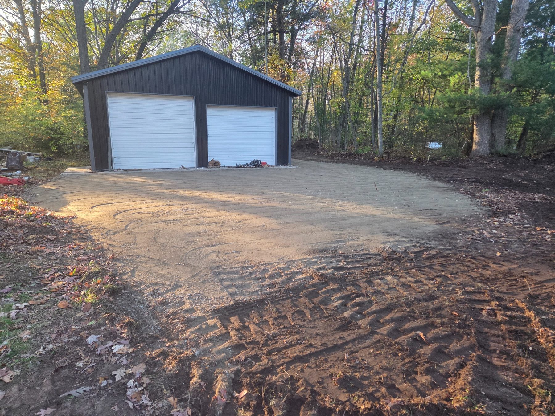 Finished crushed concrete approach and parking area in front of Fruitport garage